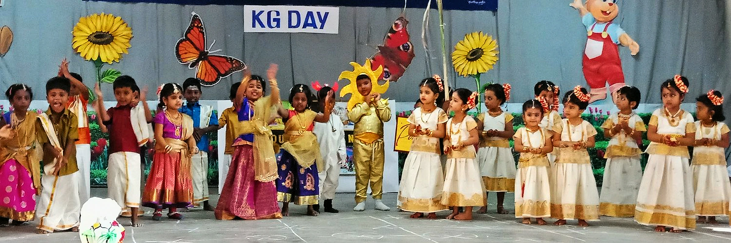 Kindergarten children in traditional costume on KG Day
